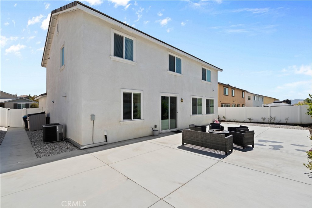12875 Wainwright Lane Moreno Valley, CA 92555 - Photo 33 of 37 a building outdoor space with patio furniture