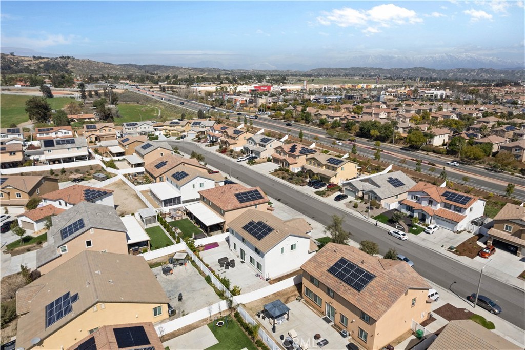 12875 Wainwright Lane Moreno Valley, CA 92555 - Photo 37 of 37 an aerial view of a city with lots of residential buildings