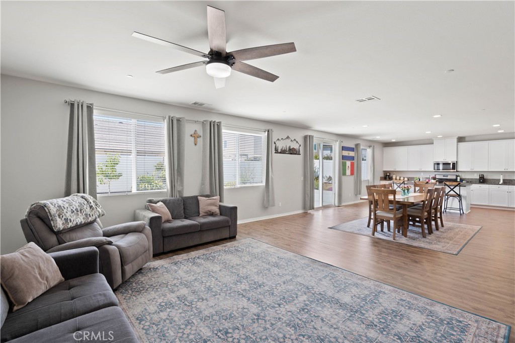 12875 Wainwright Lane Moreno Valley, CA 92555 - Photo 10 of 37 a living room with furniture and a large window