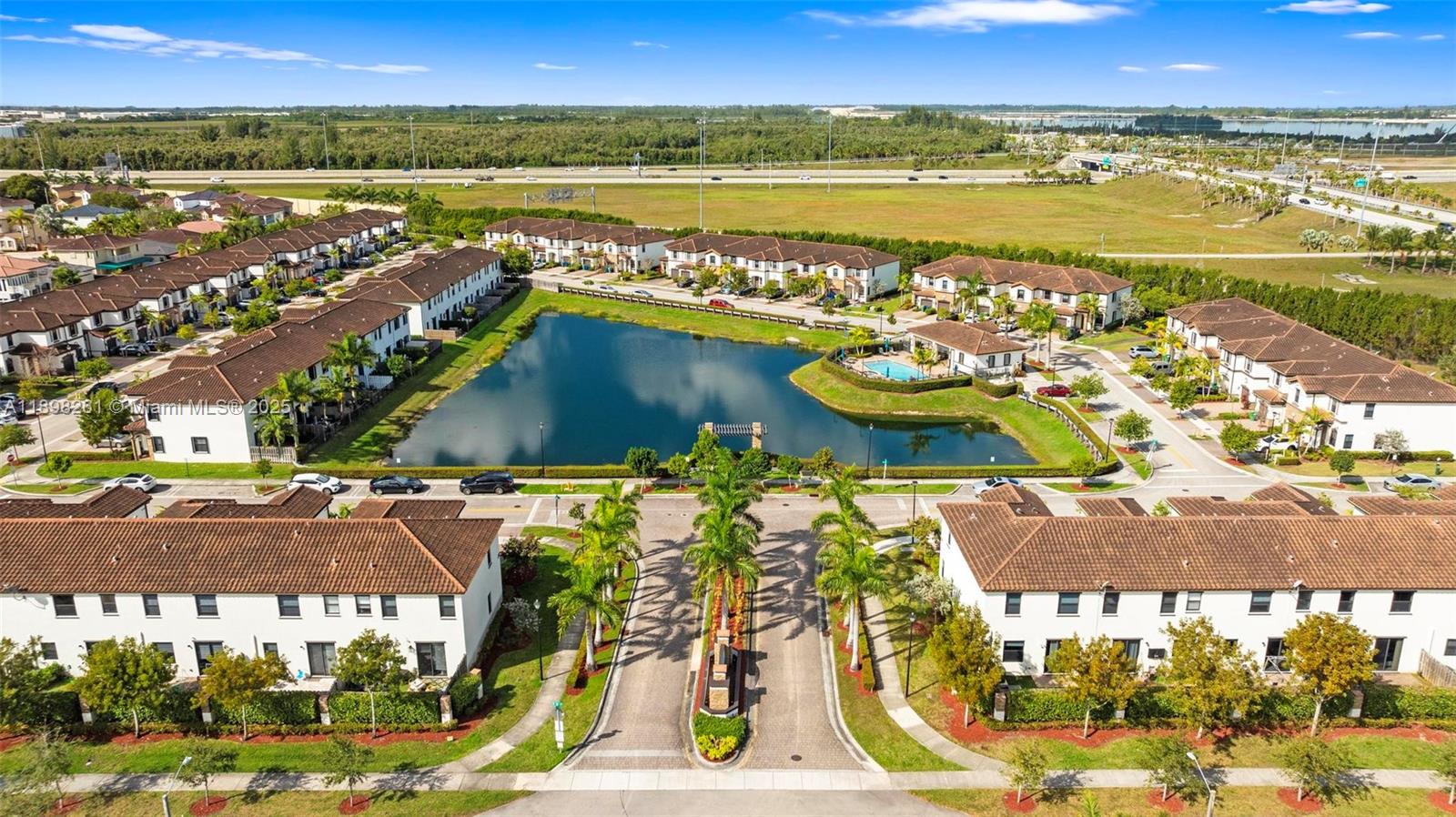 9000 Northwest 183rd Street, Unit 9000 Hialeah, FL 33018 - Photo 14 of 41 a view of a city with an ocean