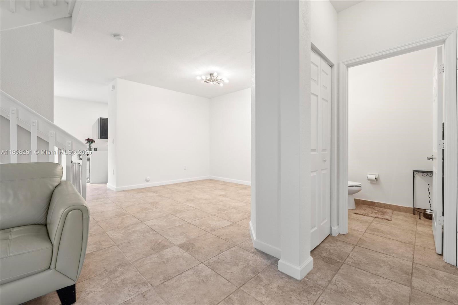 9000 Northwest 183rd Street, Unit 9000 Hialeah, FL 33018 - Photo 22 of 41 a view of livingroom and hardwood floor