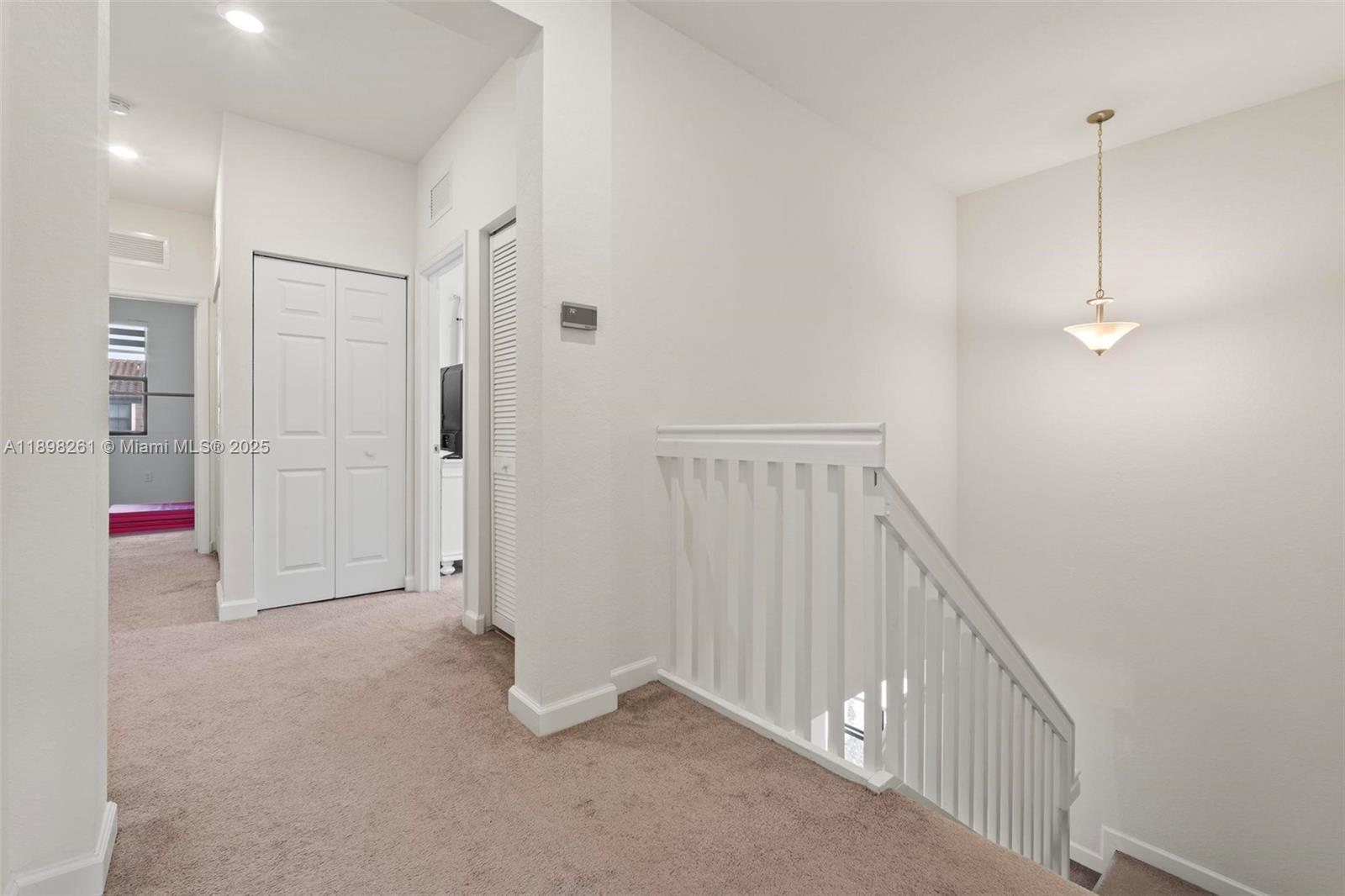 9000 Northwest 183rd Street, Unit 9000 Hialeah, FL 33018 - Photo 27 of 41 a view of an empty room