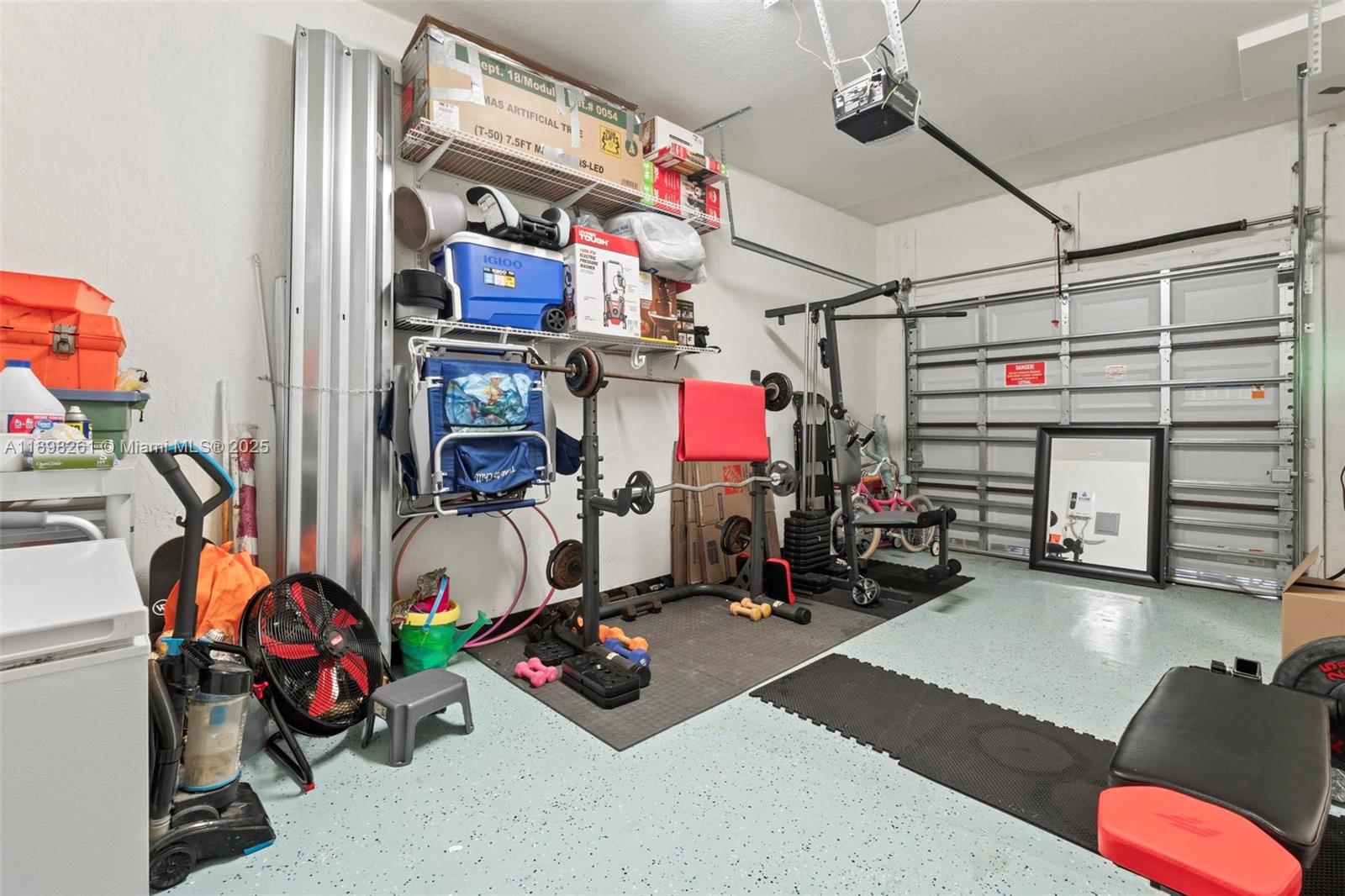 9000 Northwest 183rd Street, Unit 9000 Hialeah, FL 33018 - Photo 39 of 41 a view of a room with gym equipment