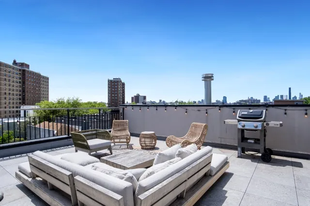 a view of a terrace with furniture