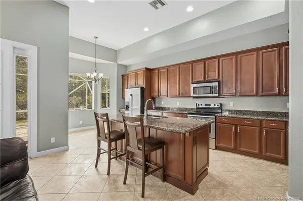 $769,000 | 5597 Southwest Longspur Lane, Palm City, FL 34990