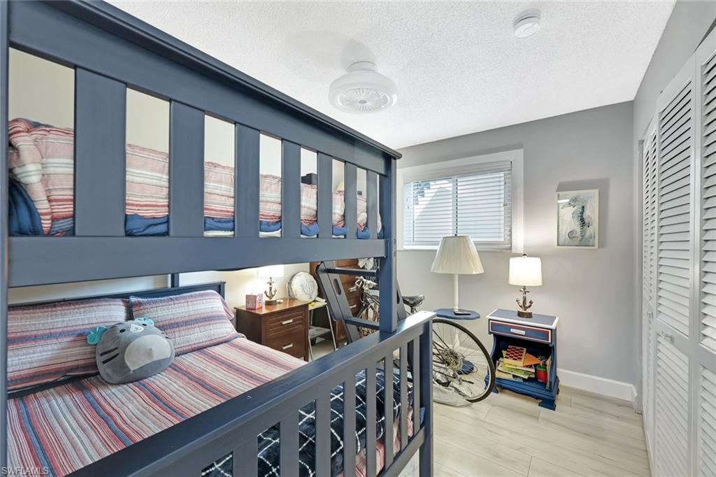 766 Central Avenue, Unit 207 Naples, FL 34102 - Photo 12 of 18 a view of a workspace with furniture and a window