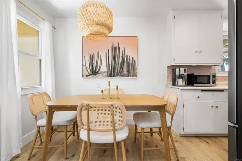 a view of a dining room with furniture