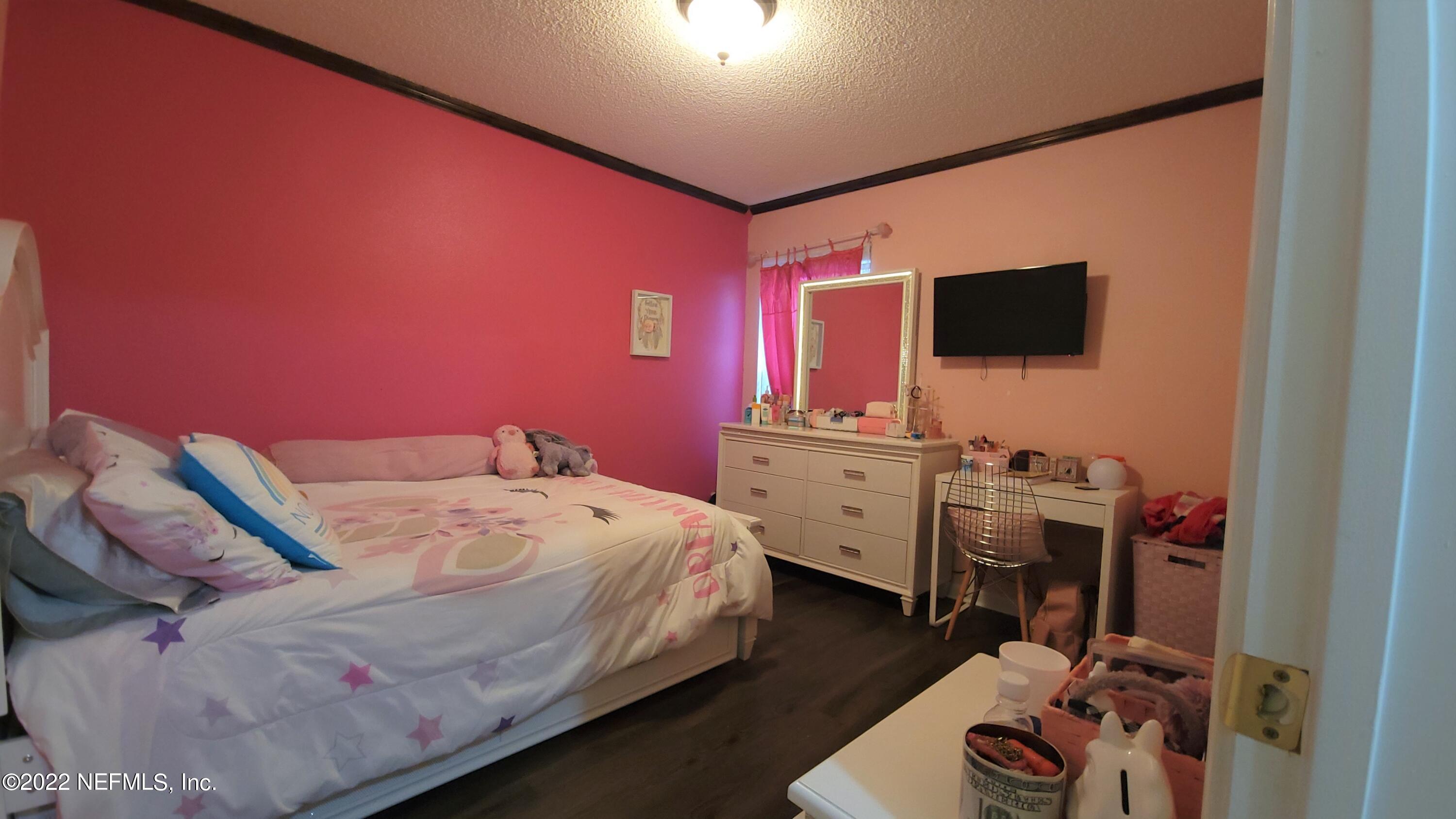 8676 Springtree Road Jacksonville, FL 32210 - Photo 11 of 15 Bedroom 2