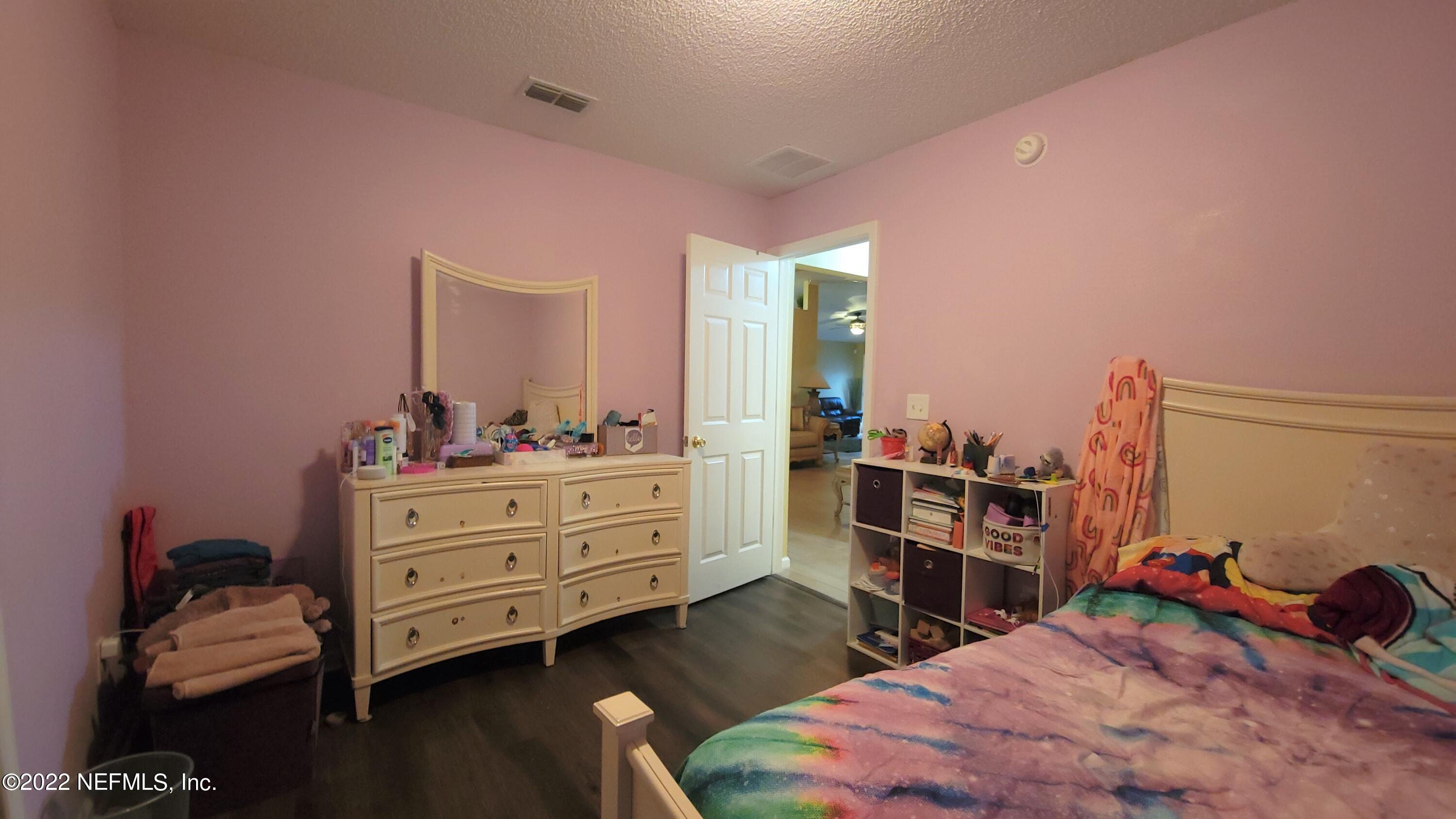 8676 Springtree Road Jacksonville, FL 32210 - Photo 12 of 15 Bedroom 3