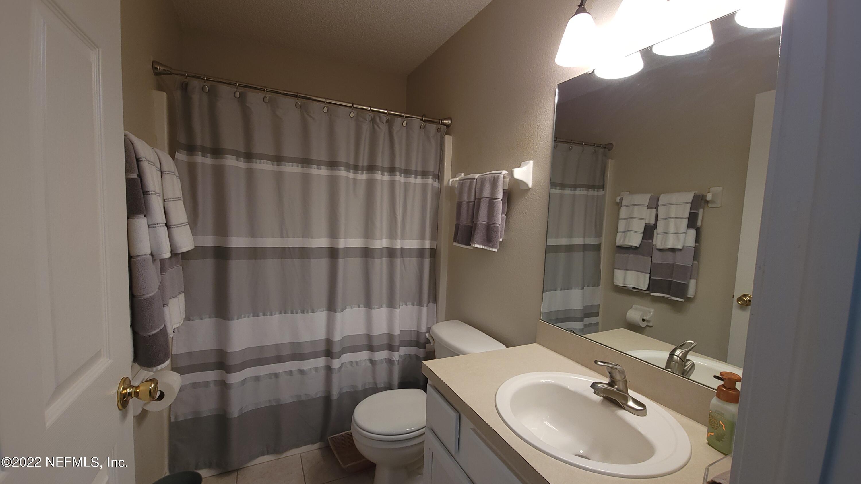 8676 Springtree Road Jacksonville, FL 32210 - Photo 13 of 15 Hall Bath
