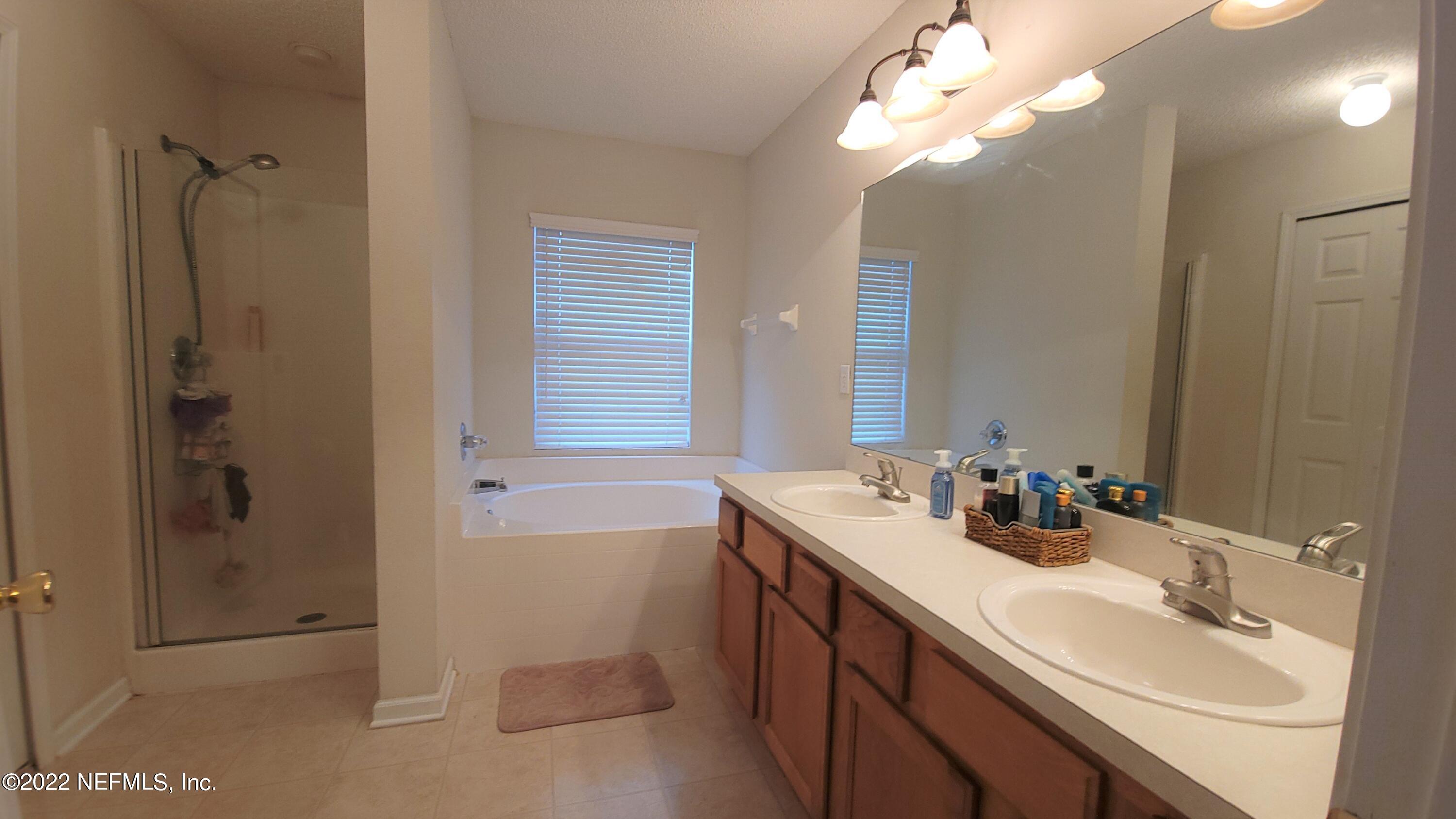 8676 Springtree Road Jacksonville, FL 32210 - Photo 10 of 15 Owners Bath