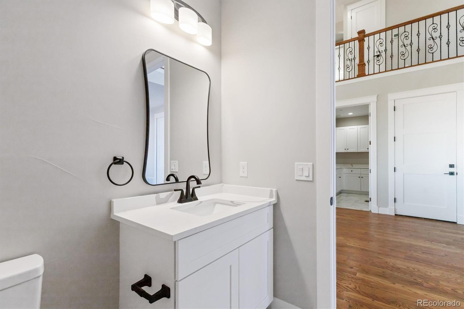13350 Imboden Road Hudson, CO 80642 - Photo 14 of 50 a bathroom with a sink and a mirror