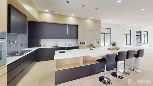 an entryway with wooden floor and windows