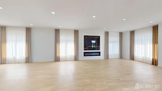 a bathroom with a glass shower door