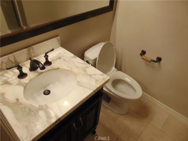 a bathroom with a sink and a toilet