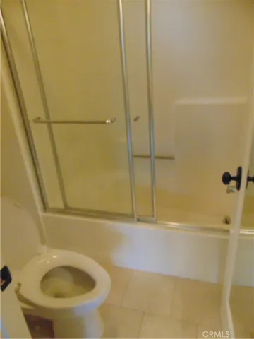 a bathroom with a sink and toilet