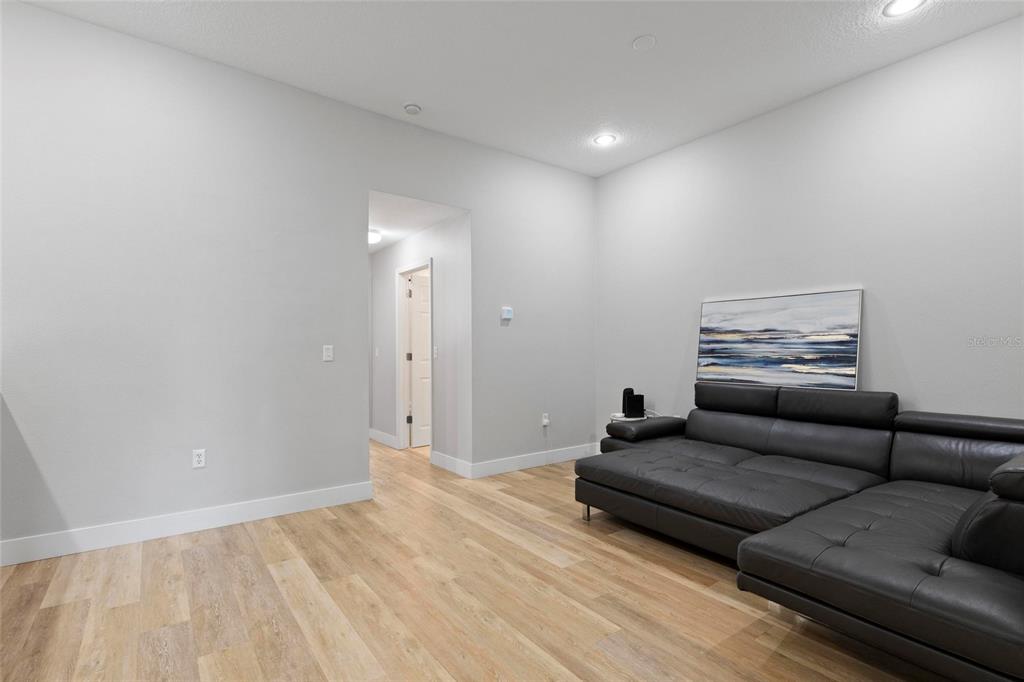 1461 Ridge Terrace Tarpon Springs, FL 34689 - Photo 22 of 25 a living room with furniture and a couch