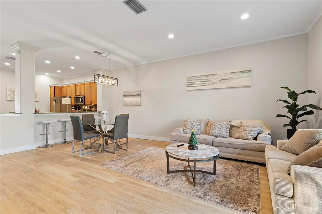 1461 Ridge Terrace Tarpon Springs, FL 34689 - Photo 10 of 25 a living room with furniture and view of kitchen