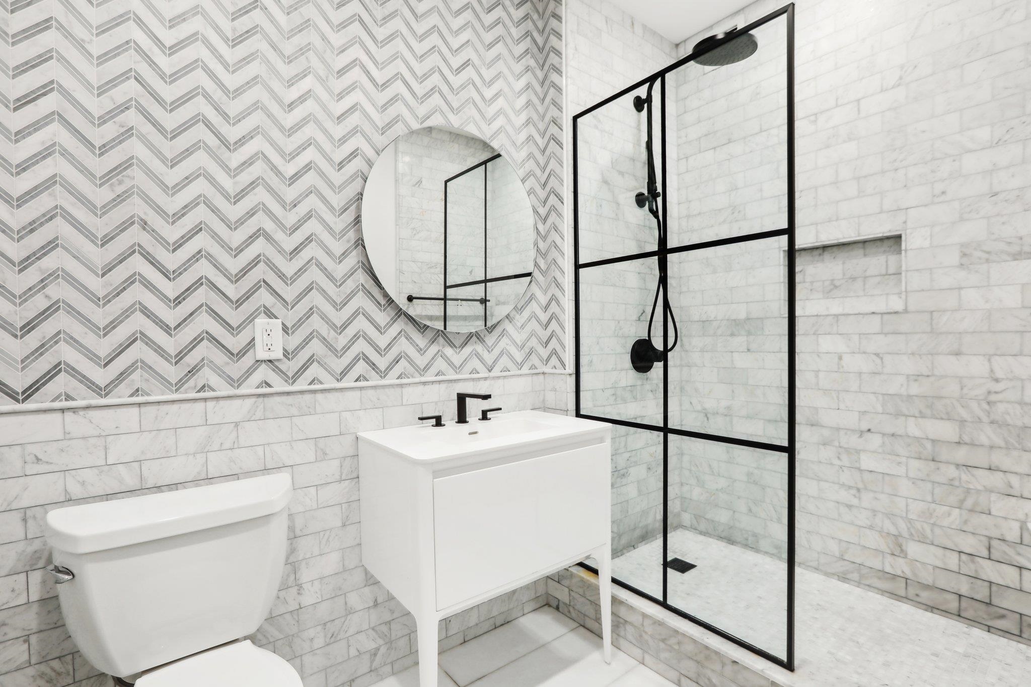 1500 Washington Street, Unit 3D Hoboken, NJ 07030 - Photo 16 of 23 a bathroom with a sink toilet and shower