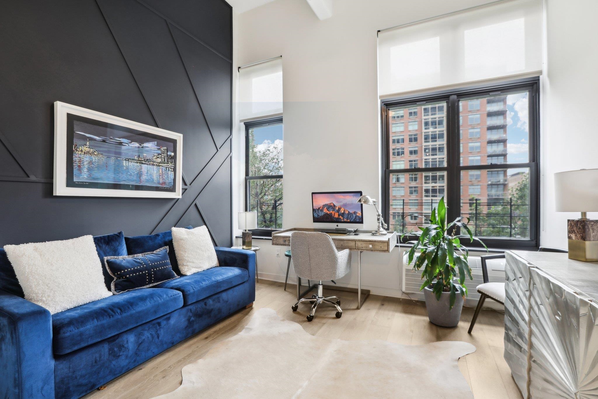 1500 Washington Street, Unit 3D Hoboken, NJ 07030 - Photo 18 of 23 a living room with furniture and a potted plant