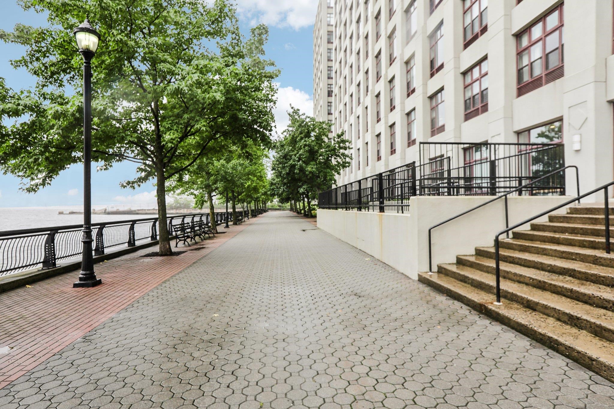 1500 Washington Street, Unit 3D Hoboken, NJ 07030 - Photo 22 of 23 a view of a building with wooden fence