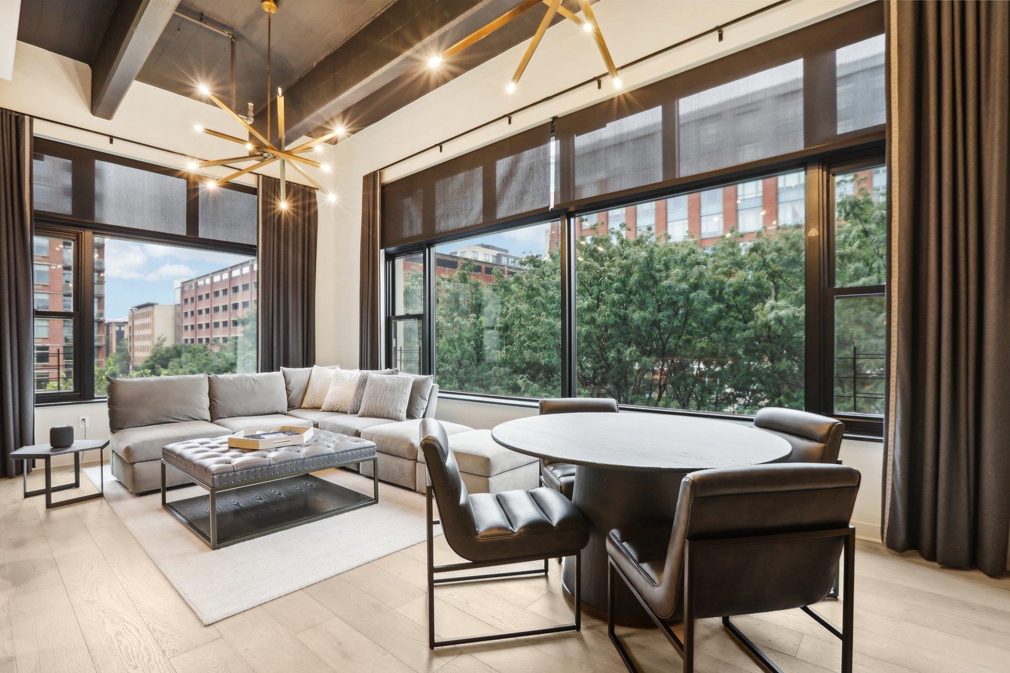1500 Washington Street, Unit 3D Hoboken, NJ 07030 - Photo 6 of 23 a living room with furniture and a large window