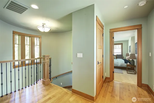 a view of a bedroom from a hallway