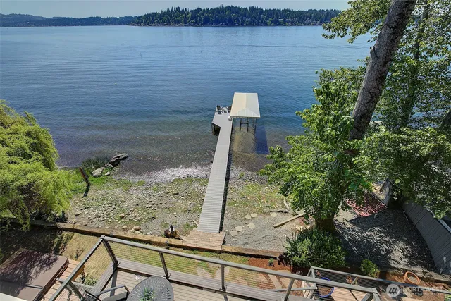 a view of a lake from a balcony