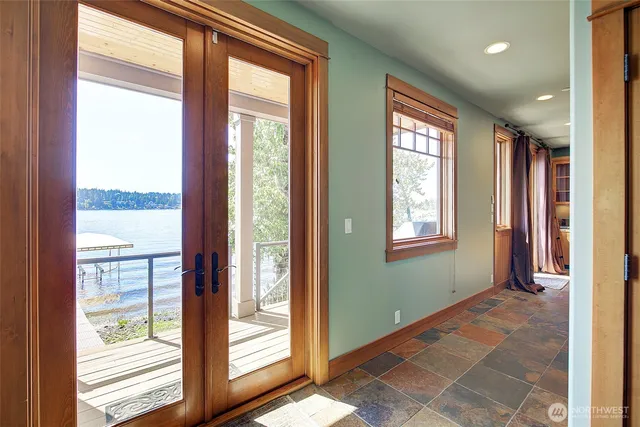 a view of an empty room and window