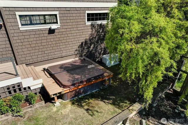 a view of a backyard with chairs
