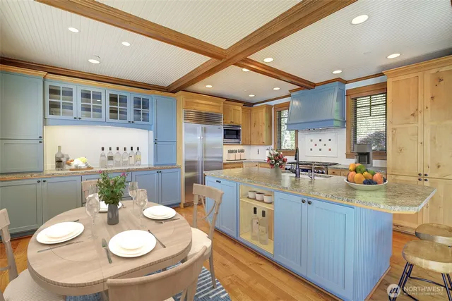 a kitchen with sink and stove