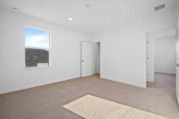a view of an empty walk in closet