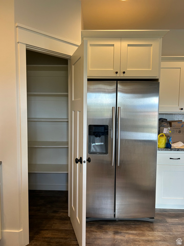 175 North 100th West Centerfield, UT 84622 - Photo 12 of 32 Walk-in pantry featuring white shelving and wood-finish flooring