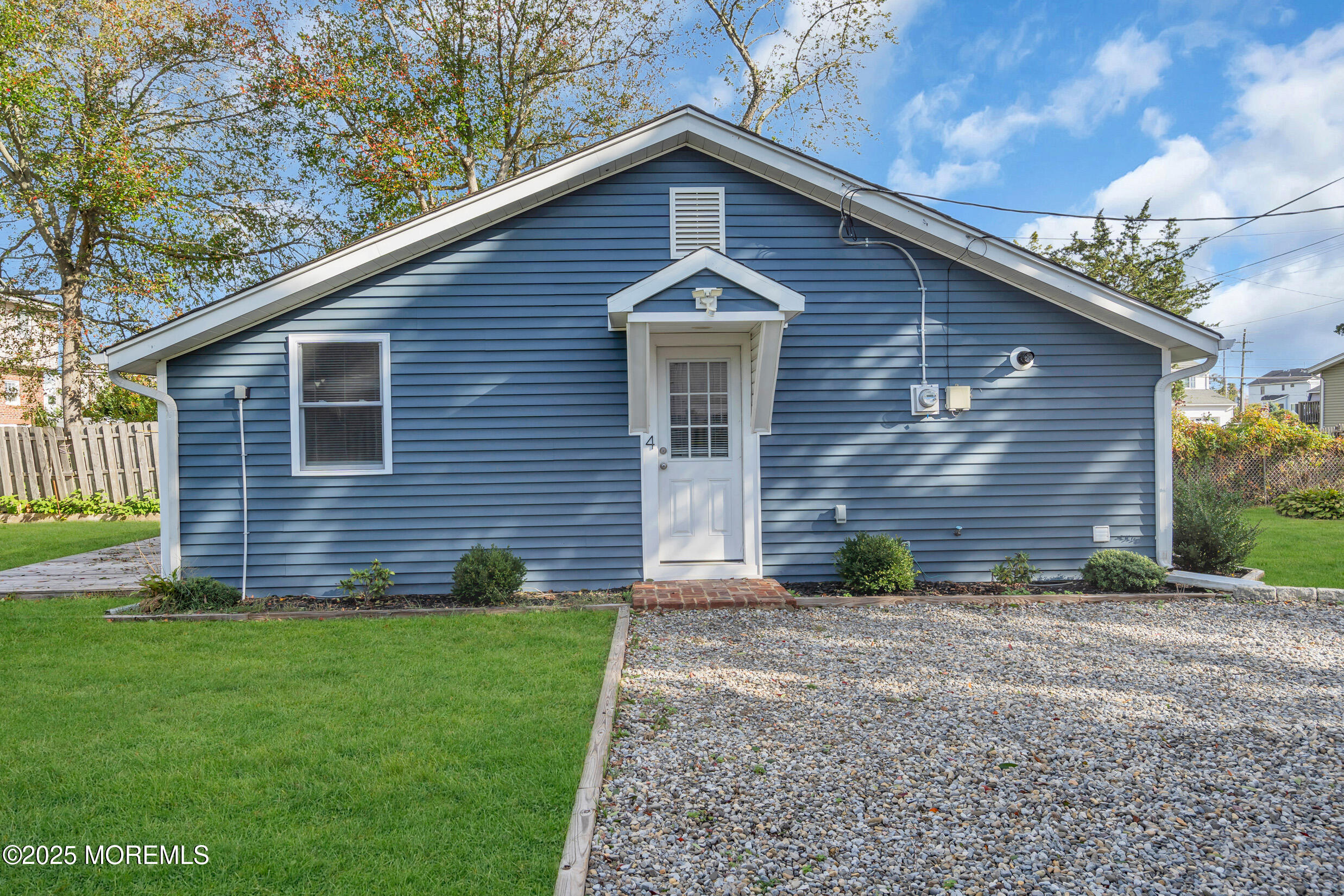 4 Pine Bluff Road Toms River, NJ 08753 - Photo 1 of 39 a front view of a house with garden