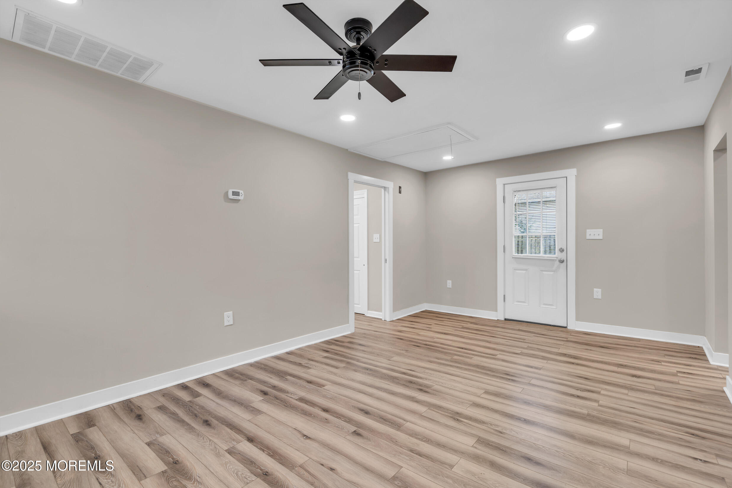 4 Pine Bluff Road Toms River, NJ 08753 - Photo 12 of 39 a view of an empty room with a window