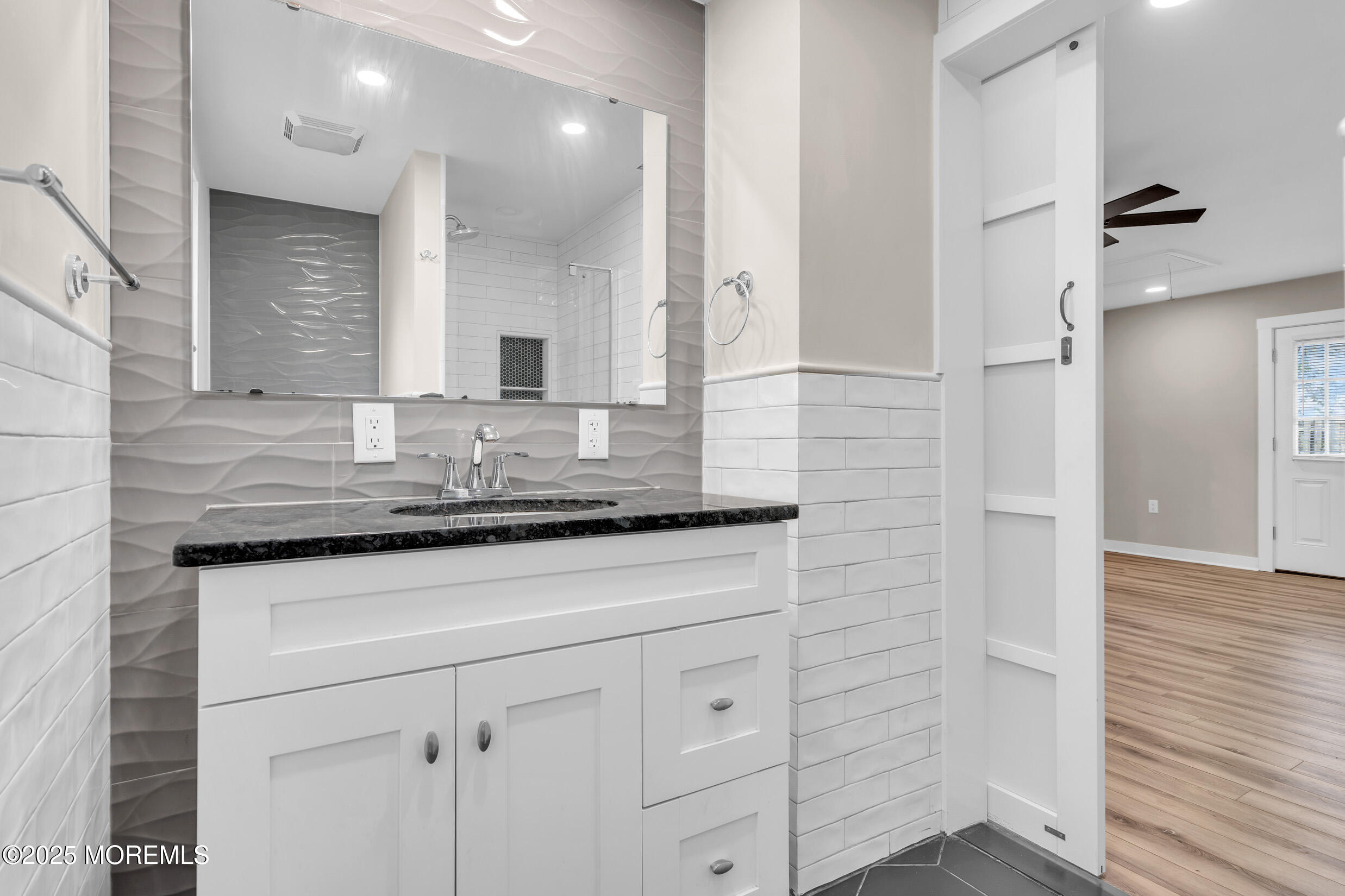 4 Pine Bluff Road Toms River, NJ 08753 - Photo 20 of 39 a bathroom with a granite countertop sink mirror and vanity