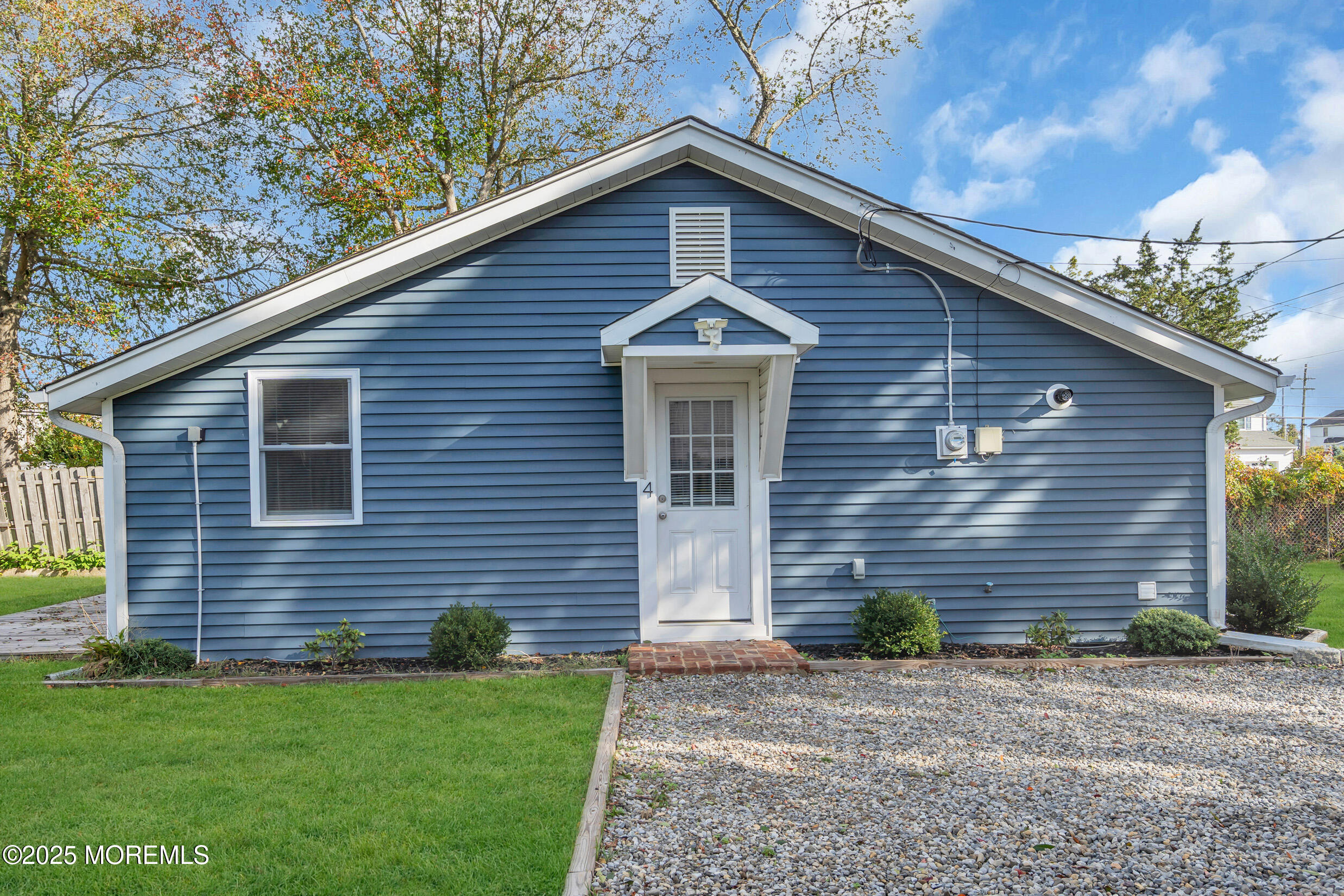 4 Pine Bluff Road Toms River, NJ 08753 - Photo 2 of 39 a front view of a house with a yard