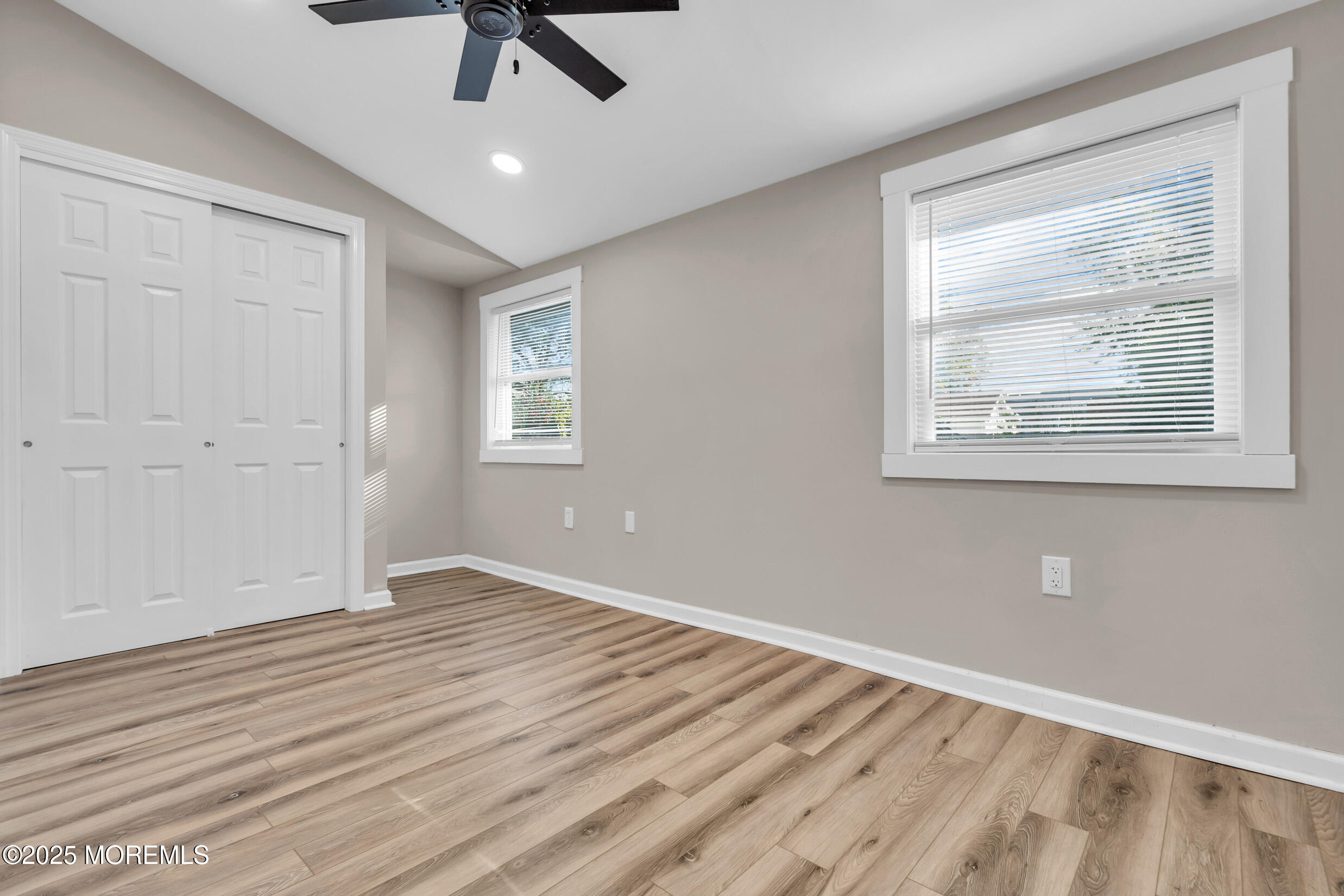 4 Pine Bluff Road Toms River, NJ 08753 - Photo 24 of 39 a view of an empty room with wooden floor and a window