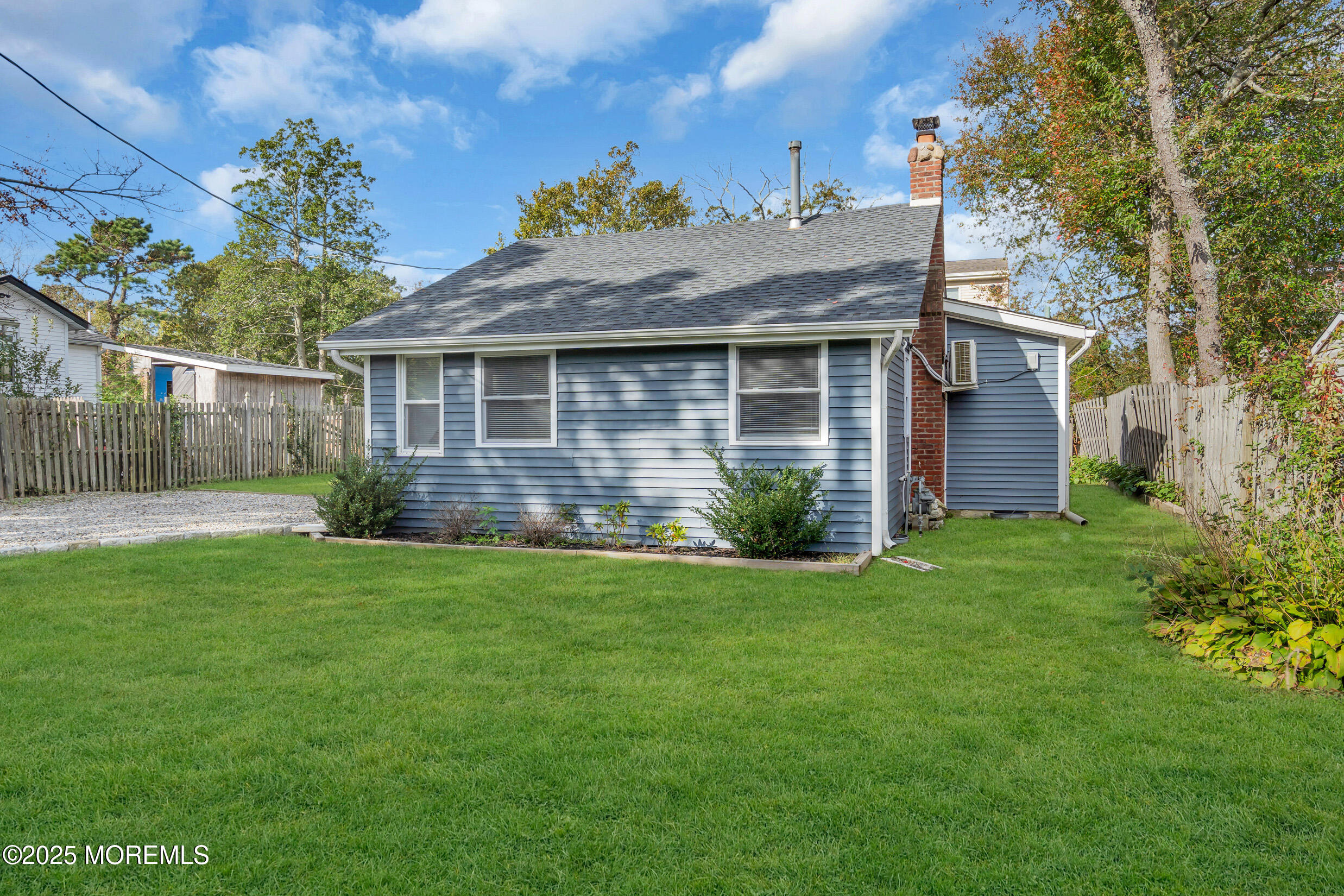 4 Pine Bluff Road Toms River, NJ 08753 - Photo 27 of 39 a view of a house with a yard