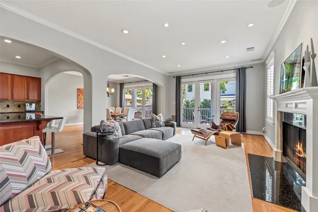 an aerial view of multiple houses with yard