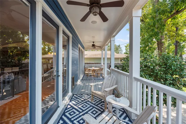 a spacious bathroom with a tub sink shower and mirror