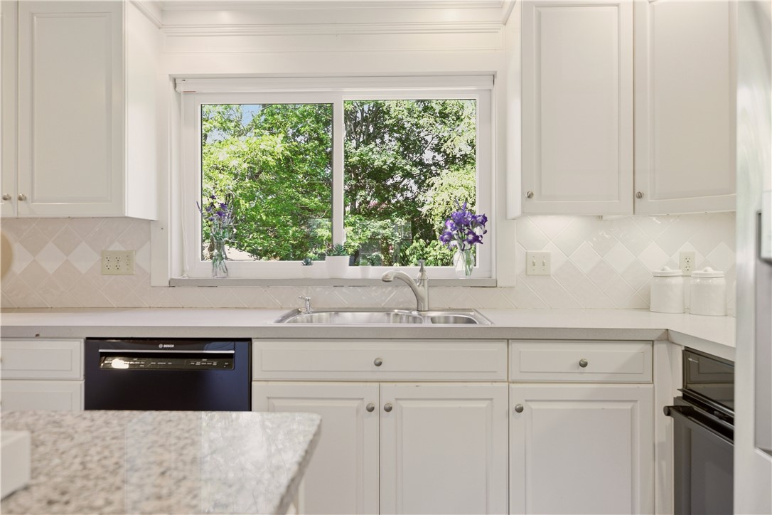 5 Heritage Road Bristol, RI 02809 - Photo 11 of 50 Kitchen with picture window view of backyard