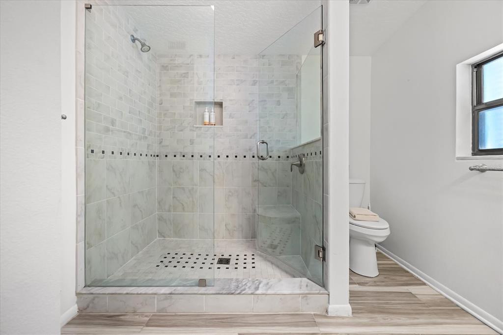 936 Santa Cruz Road Cocoa Beach, FL 32931 - Photo 11 of 45 a bathroom with a shower