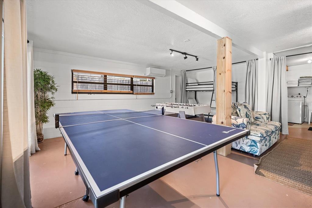 936 Santa Cruz Road Cocoa Beach, FL 32931 - Photo 27 of 45 a room with gym equipment