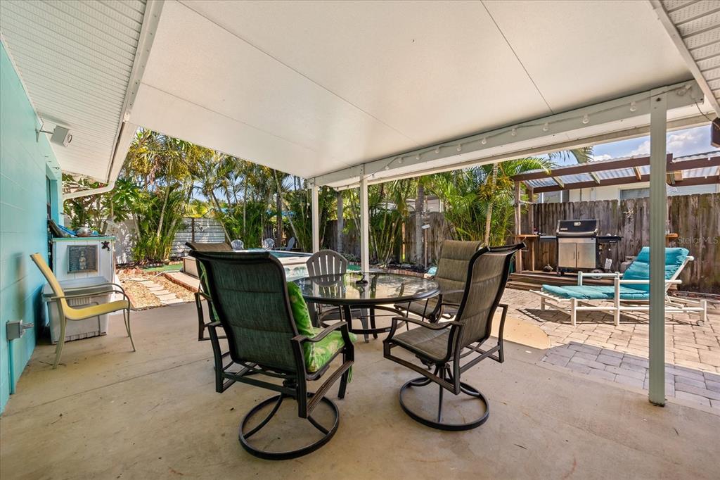 936 Santa Cruz Road Cocoa Beach, FL 32931 - Photo 29 of 45 a view of a dining room with furniture window and outside view
