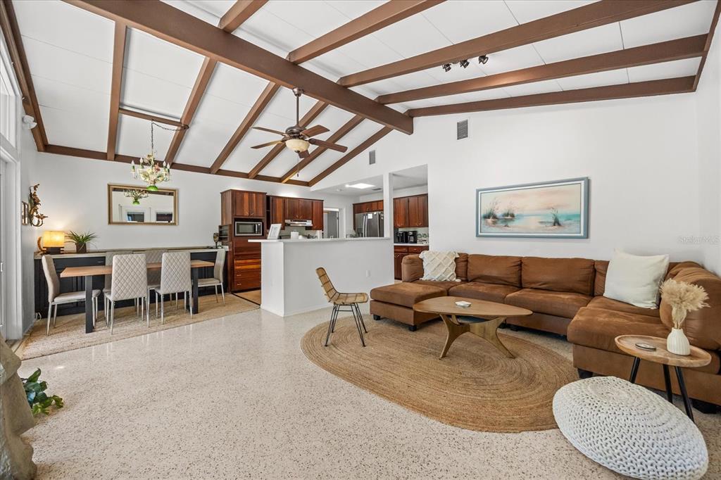 936 Santa Cruz Road Cocoa Beach, FL 32931 - Photo 3 of 45 a living room with furniture and a large window