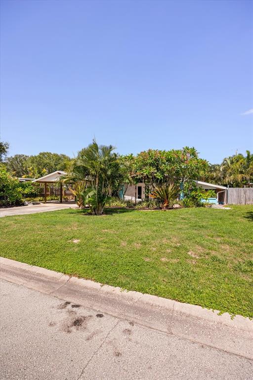 936 Santa Cruz Road Cocoa Beach, FL 32931 - Photo 38 of 45 a view of building with outdoor space