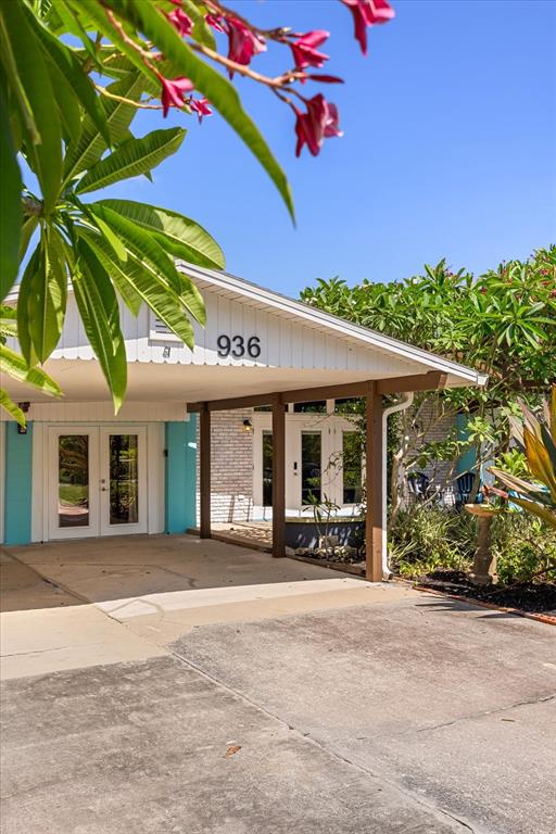936 Santa Cruz Road Cocoa Beach, FL 32931 - Photo 39 of 45 a view of a building with a outdoor space