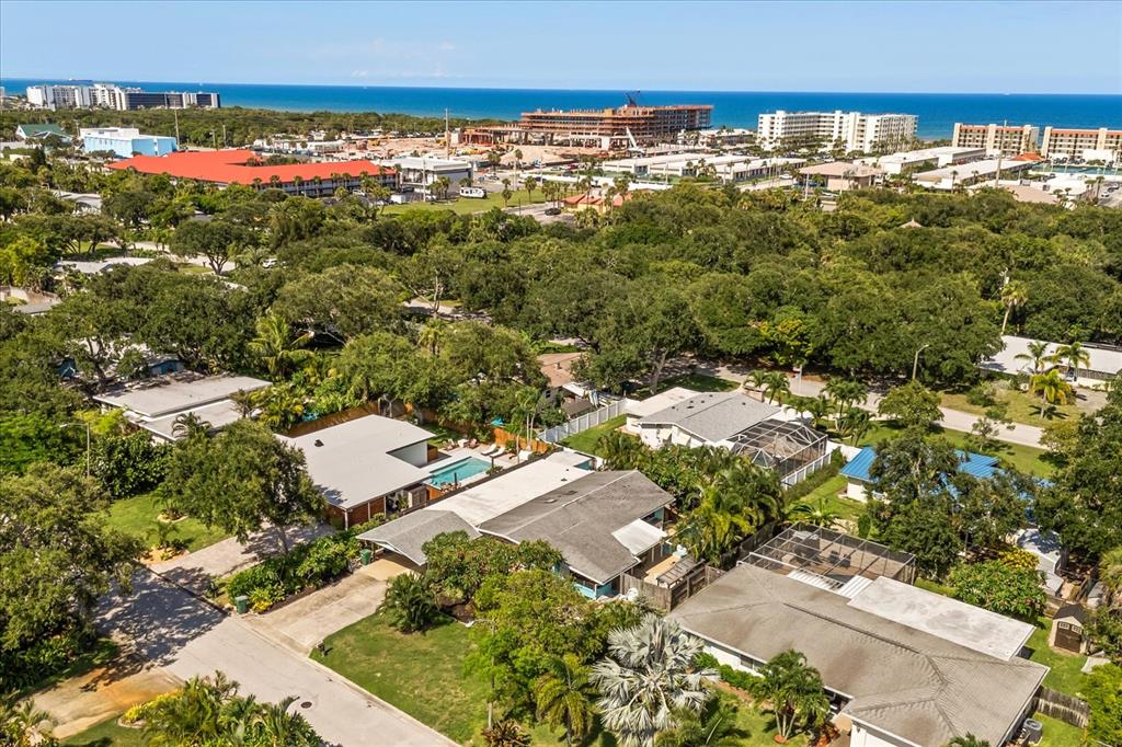 936 Santa Cruz Road Cocoa Beach, FL 32931 - Photo 43 of 45 an aerial view of residential houses with outdoor space and trees