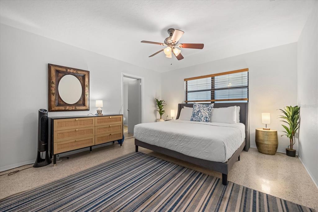 936 Santa Cruz Road Cocoa Beach, FL 32931 - Photo 9 of 45 a bedroom with a bed and window